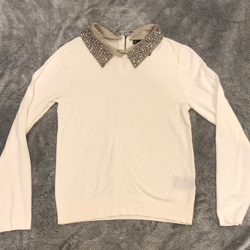 Ivory sweater with bejeweled color